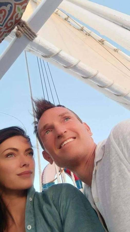 Sandrine and Jonathan together on a sailing boat